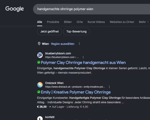 Eine Google-Suchergebnisseite für 'handgemachte ohrringe polymer wien' mit Suchergebnissen wie blueberrybloom.com und passenden Shopping-Anzeigen.